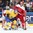 MOSCOW, RUSSIA - MAY 8: Sweden's Jimmie Ericsson #21 battles for position with Denmark's Oliver Lauridsen #25 while Sebastian Dahm #32 looks on during preliminary round action at the 2016 IIHF Ice Hockey Championship. (Photo by Andre Ringuette/HHOF-IIHF Images)

